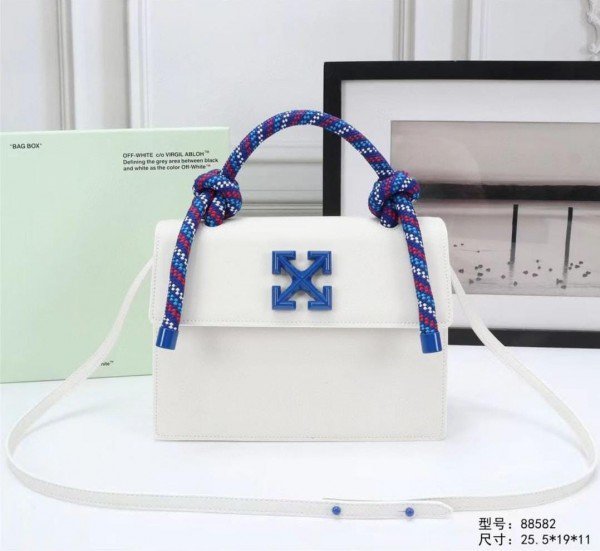1000132708.jpg Off-White Leather Insert Gummy white with Metallic Blue Arrows At Front. Rope Handle Jitney 1.4 Shoulder Bag (D88532 White) - Image 1