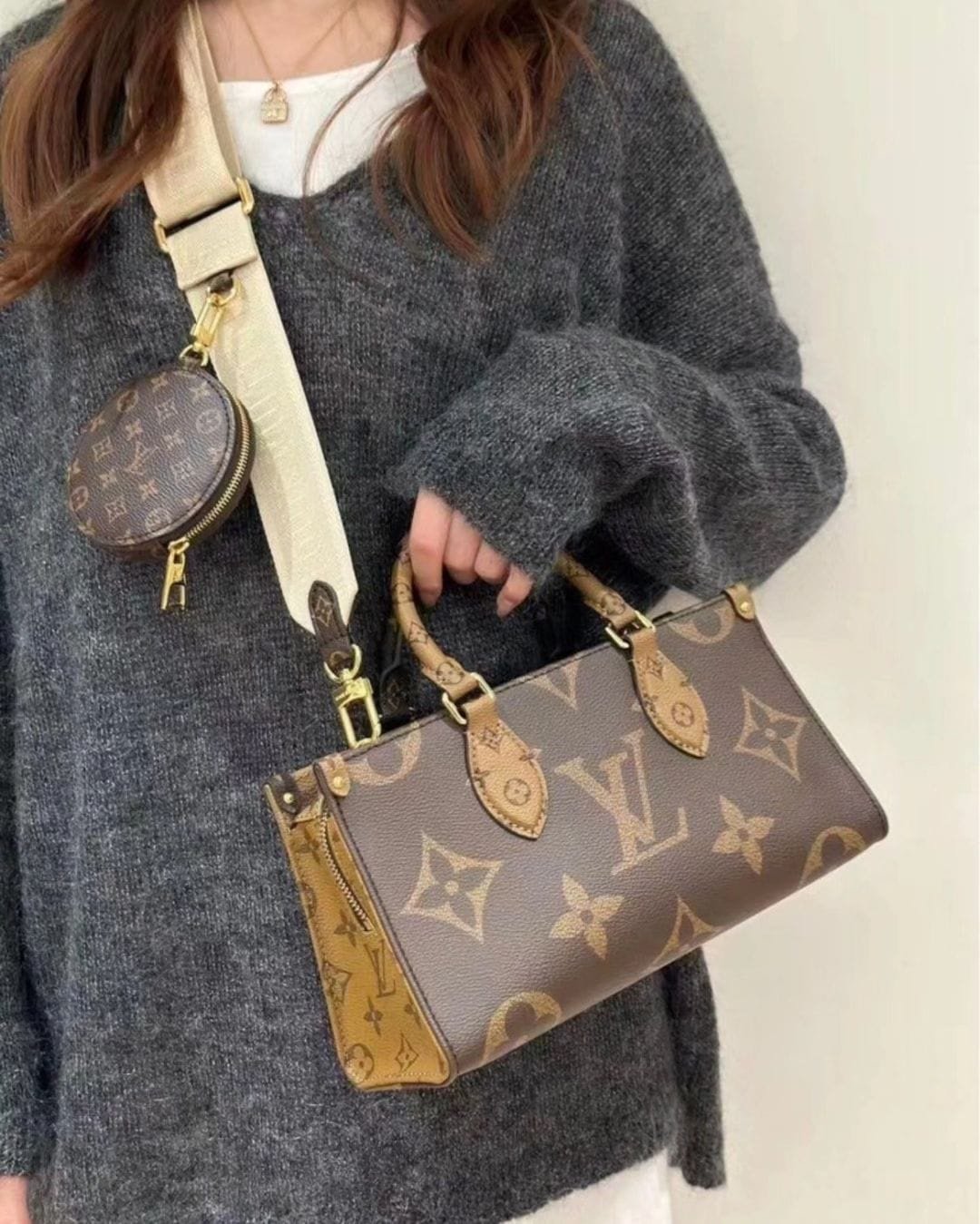 3cadbfc6-a541-4ac9-a9bc-5edbc3187ae9.jpeg Louis Vuitton OnTheGo East West Pouch - Image 1