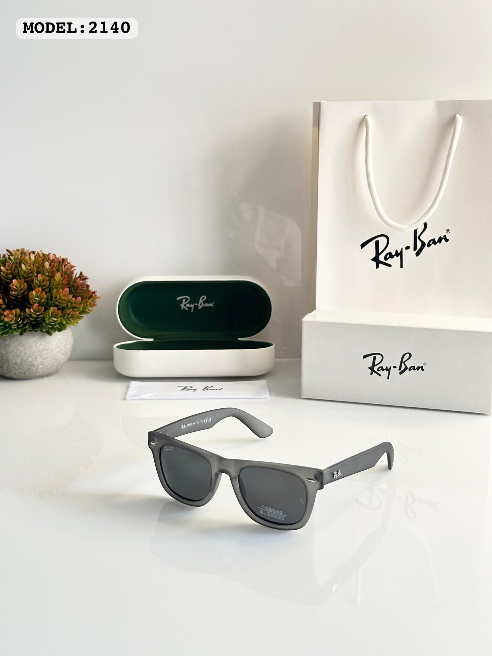 3ff00be2-7896-4892-8545-11e42ec8995d-scaled-1.jpeg Rayban Grey - Image 1