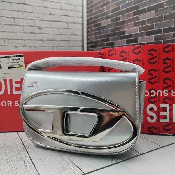 img_1152.jpeg Diesal 10 Dr Shoulder Bag with og box & Dust bag Exr Shoulder strap (Silver) - Image 1