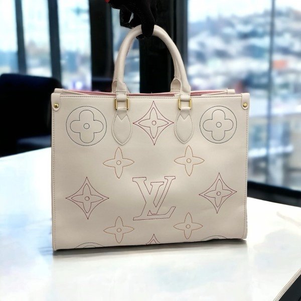 img_7483.jpeg Louis Vuitton LV On The Go Monogram Leather Tote Bag With Dust Bag (Cream - 695) - Image 1